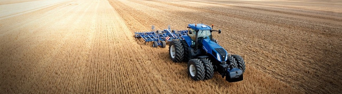 New Holland Tractor in agricultural field